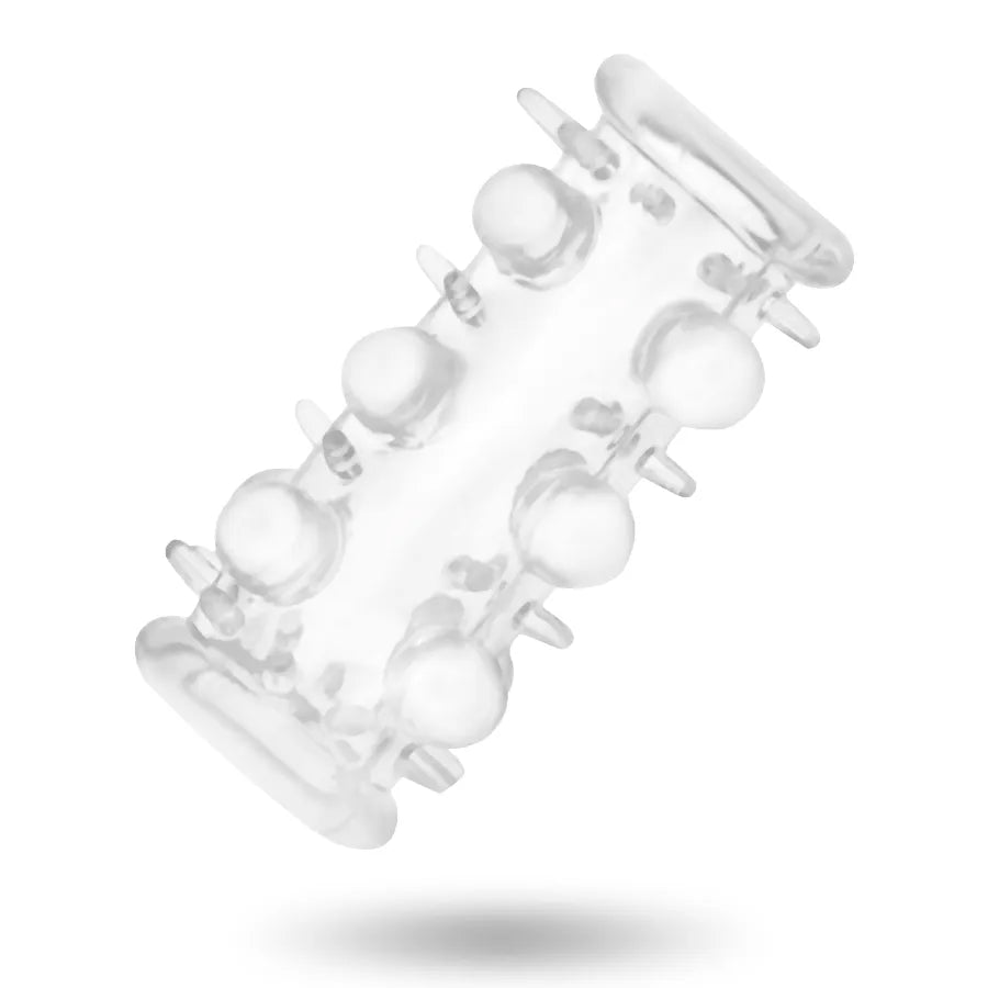 Anneau pénien texturé transparent en silicone, extensible et ergonomique, pour stimulation accrue et plaisir prolongé.