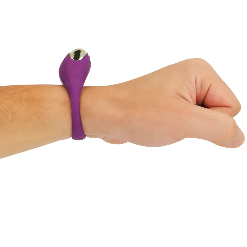 Bracelet montre violet connecté pour contrôle de cockring vibrant luxe, design ergonomique et moderne.