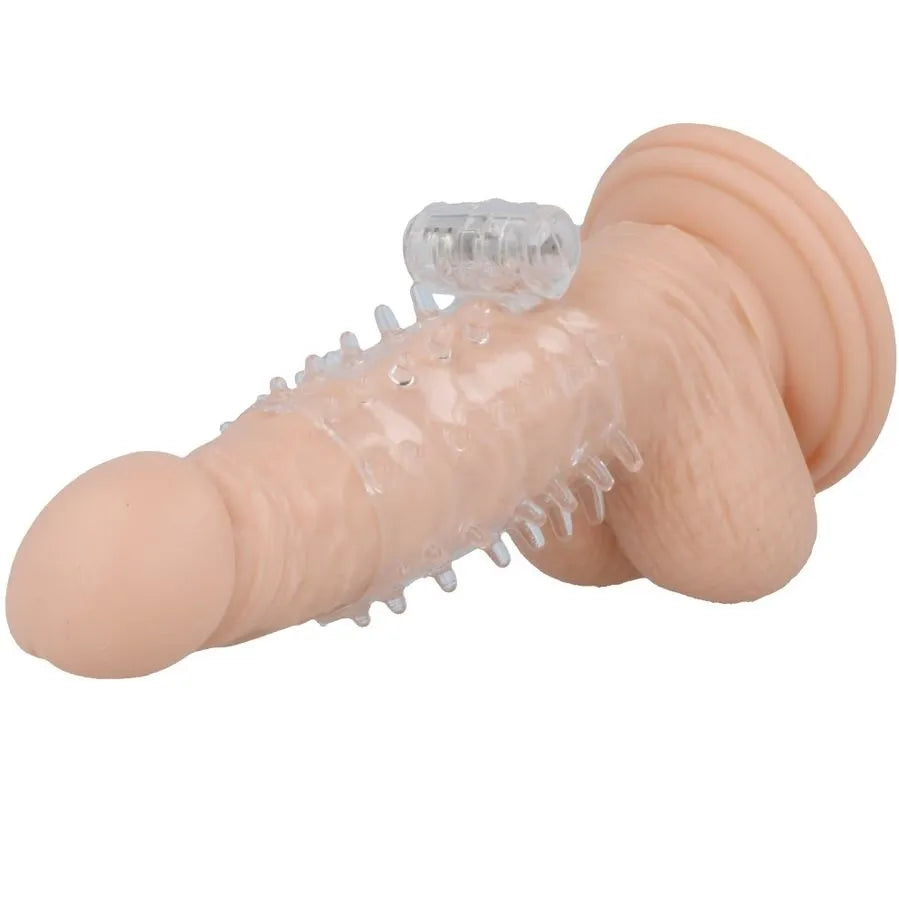 Anneau vibrant transparent en TPR sur pénis factice, extensible, texturé pour érections renforcées et sensations intenses.