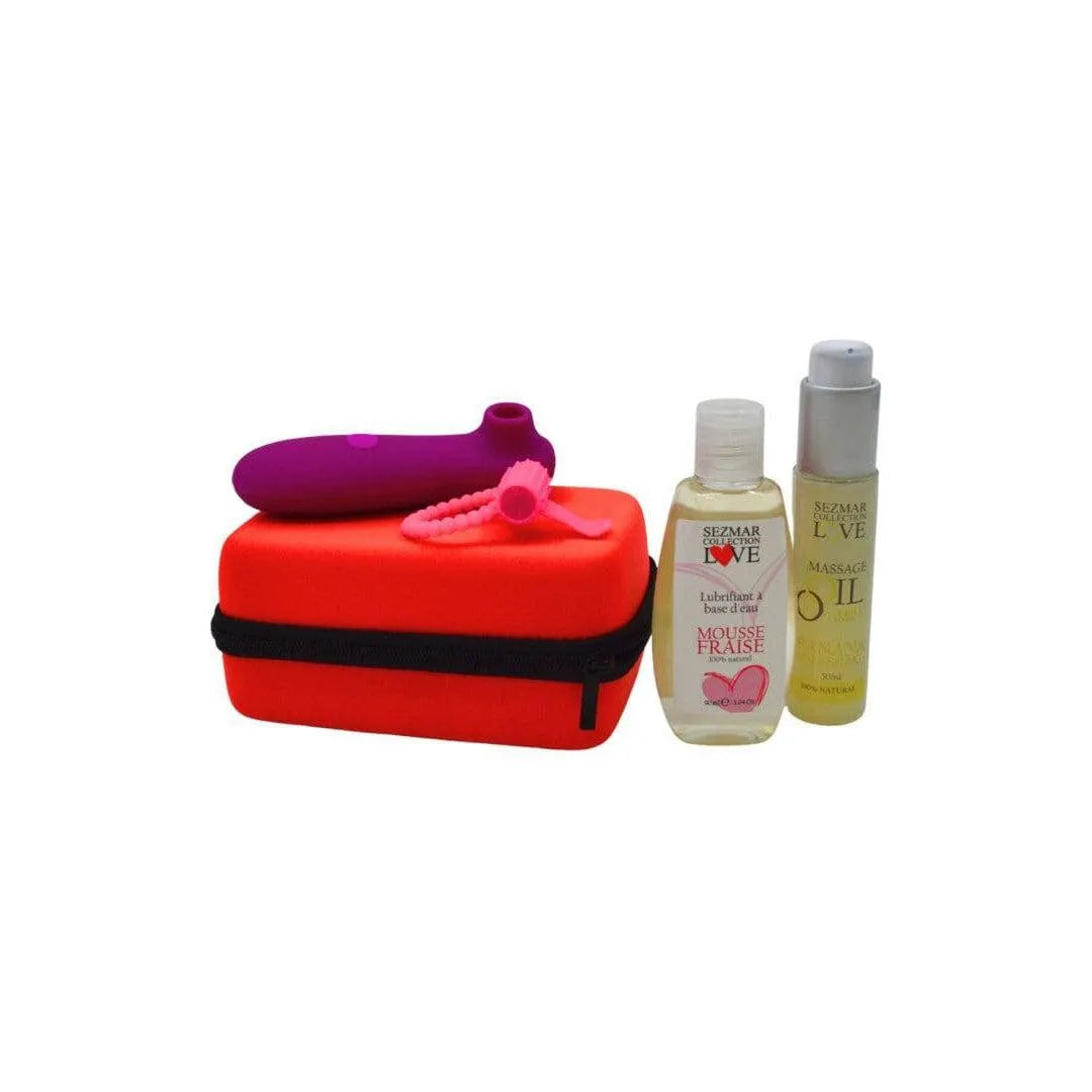 Coffret intime été: stimulateur violet, anneau vibrant rose, huile massage, étui rouge. Accessoires naturels pour couples.