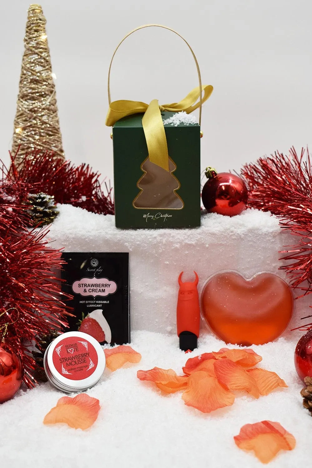 coffret massage plaisir noël édition limitée huile parfumée fraise dosette chauffante coeur chauffant réutilisable bougie naturelle pétales rose mini vibromasseur