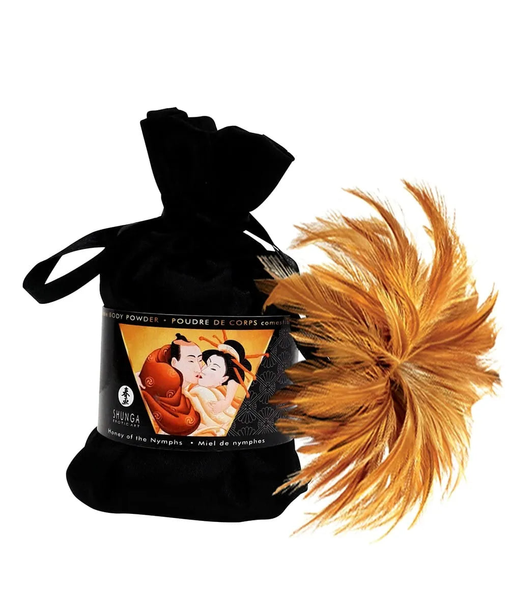 Coffret massage érotique avec huile chocolat caramel, plumeau doré, sac noir, pour expérience sensorielle aphrodisiaque.