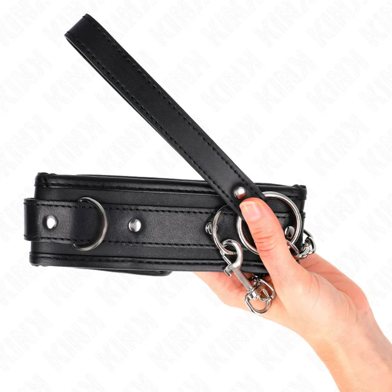 Collier BDSM cuir végétalien noir avec boucles métalliques, design ergonomique et élégant, Kinque Boutique.