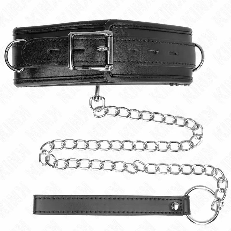 Collier BDSM cuir noir ajustable, design élégant avec boucles et chaîne métallique, luxe discret et raffiné.