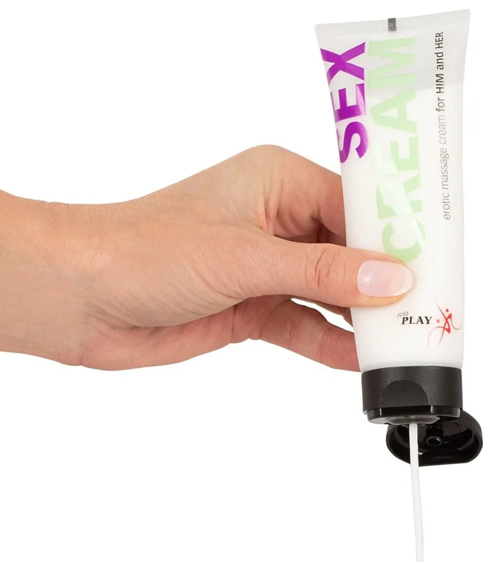 Tube de crème stimulante intime unisexe 80ml, design blanc et violet, enrichi en huiles végétales et extraits aphrodisiaques.