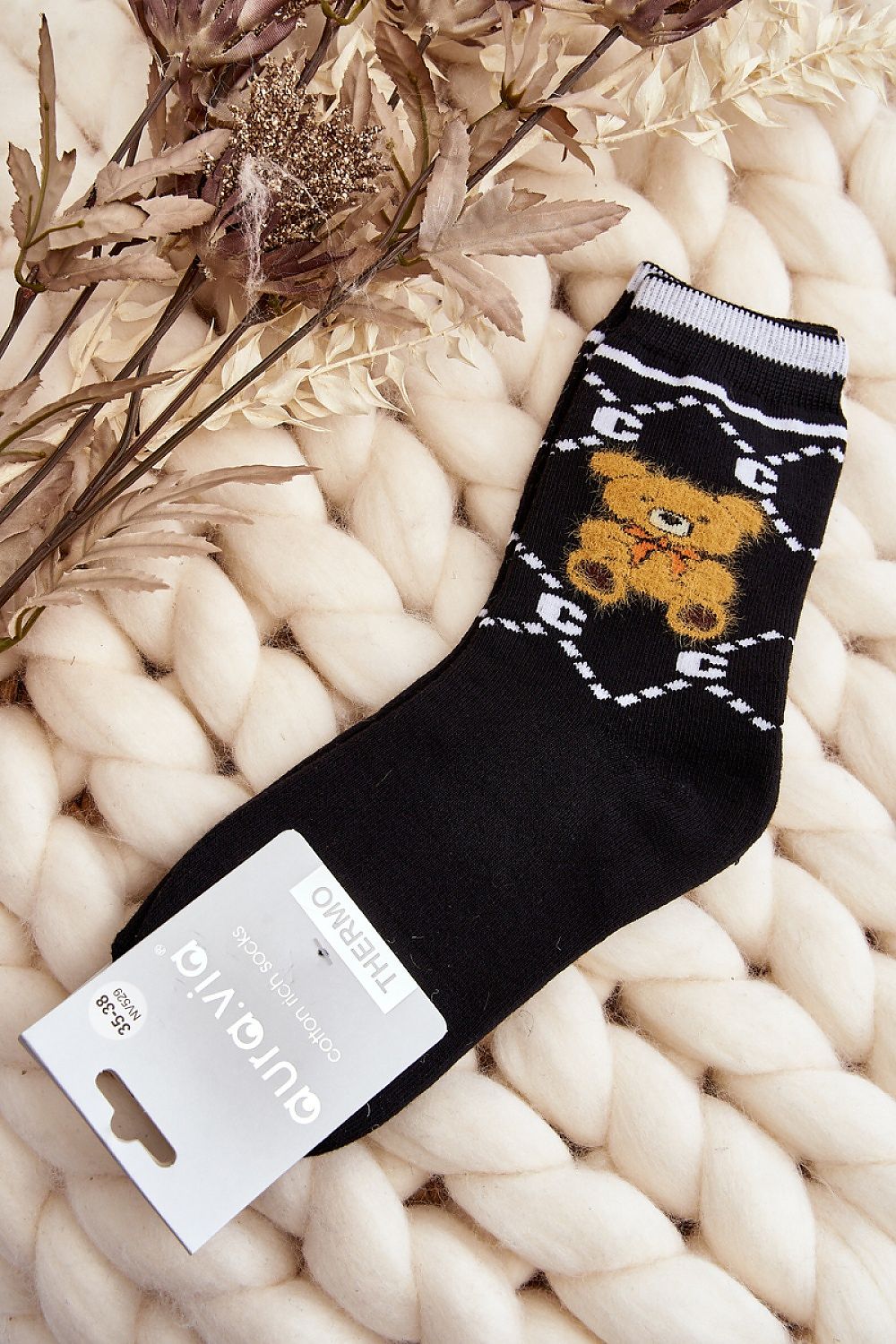 Chaussettes noires pour femmes avec patch ourson, trépointe ajustée, coton 85%, idéales pour temps froid.