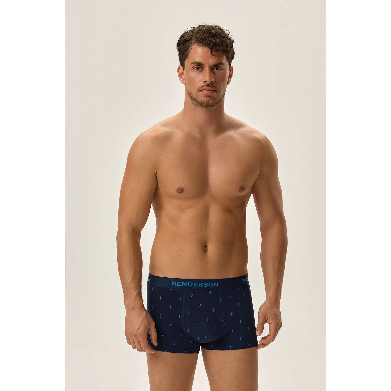 Boxers homme Henderson bleu marine, coupe ajustée, motifs subtils, ceinture élastique avec logo, confort coton élasthanne.