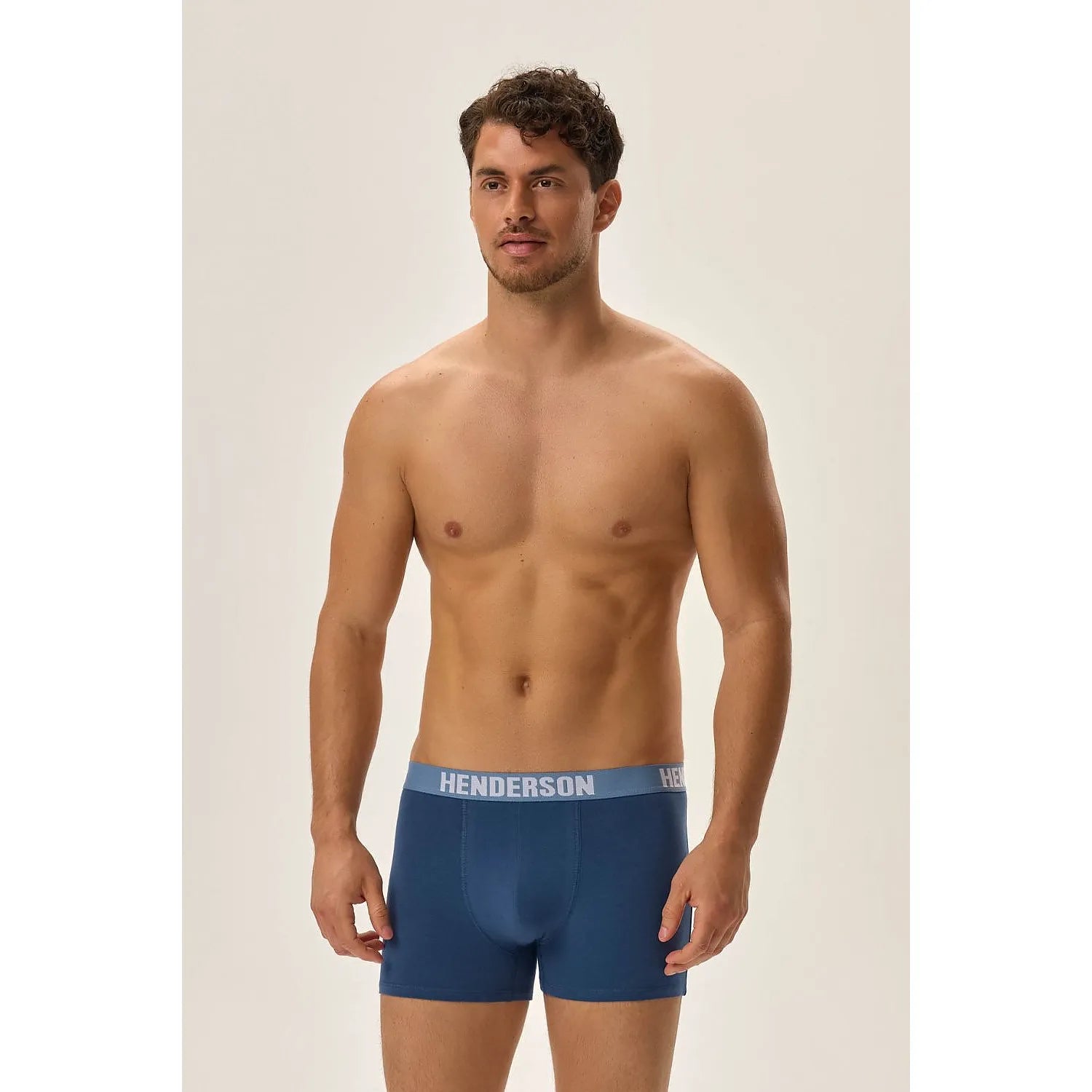 Boxer homme Henderson bleu foncé, taille élastique large, coupe ajustée, design moderne, coton respirant.