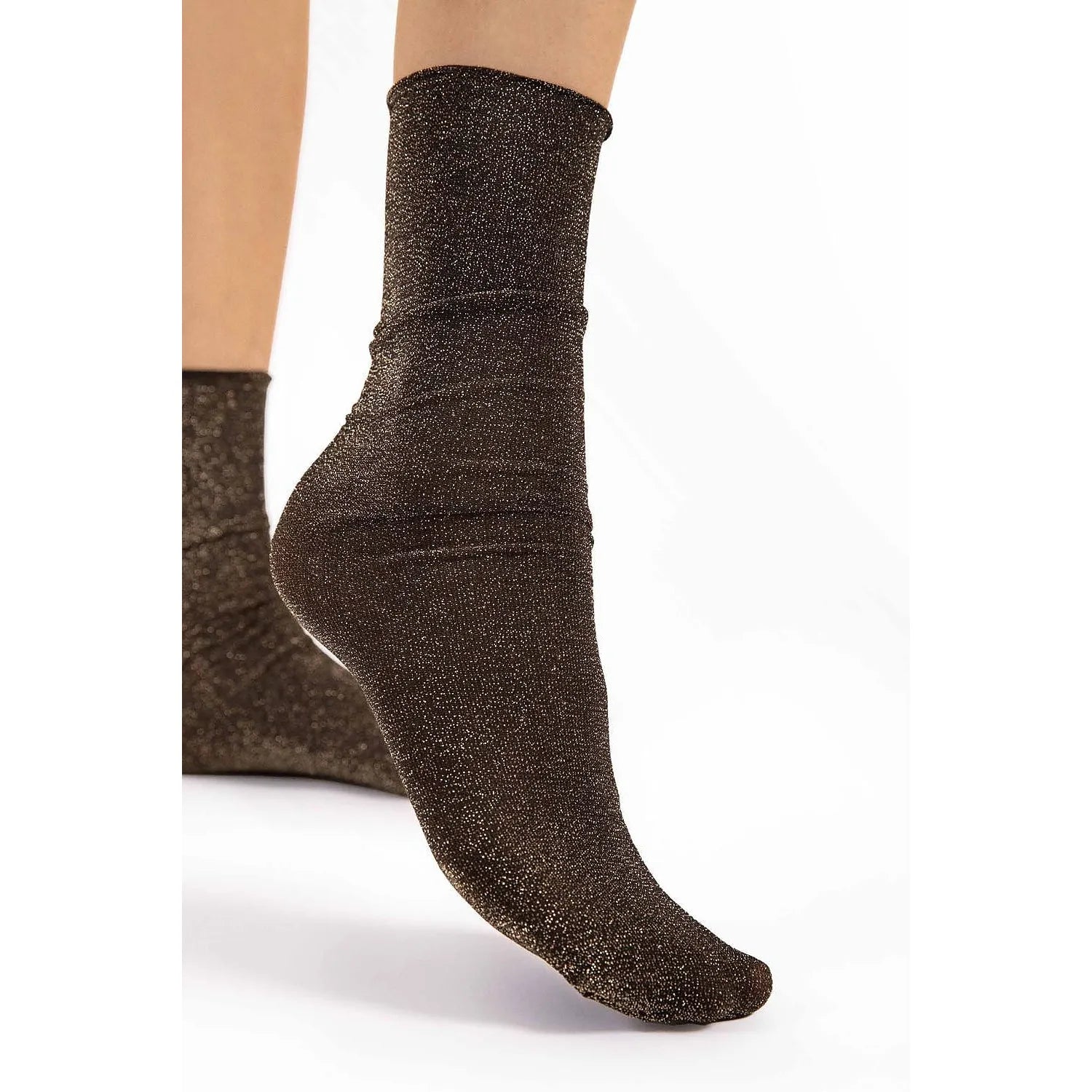 Chaussettes mi-mollet scintillantes Fiore noires, lurex brillant, extensibles, bord invisible, élégance glamour européenne.