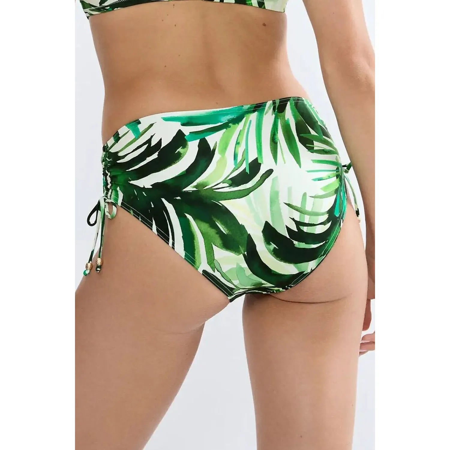 Bas de bikini ajustable vert à motif de palmes, tissu recyclé, coupe élégante et confortable, vue arrière.