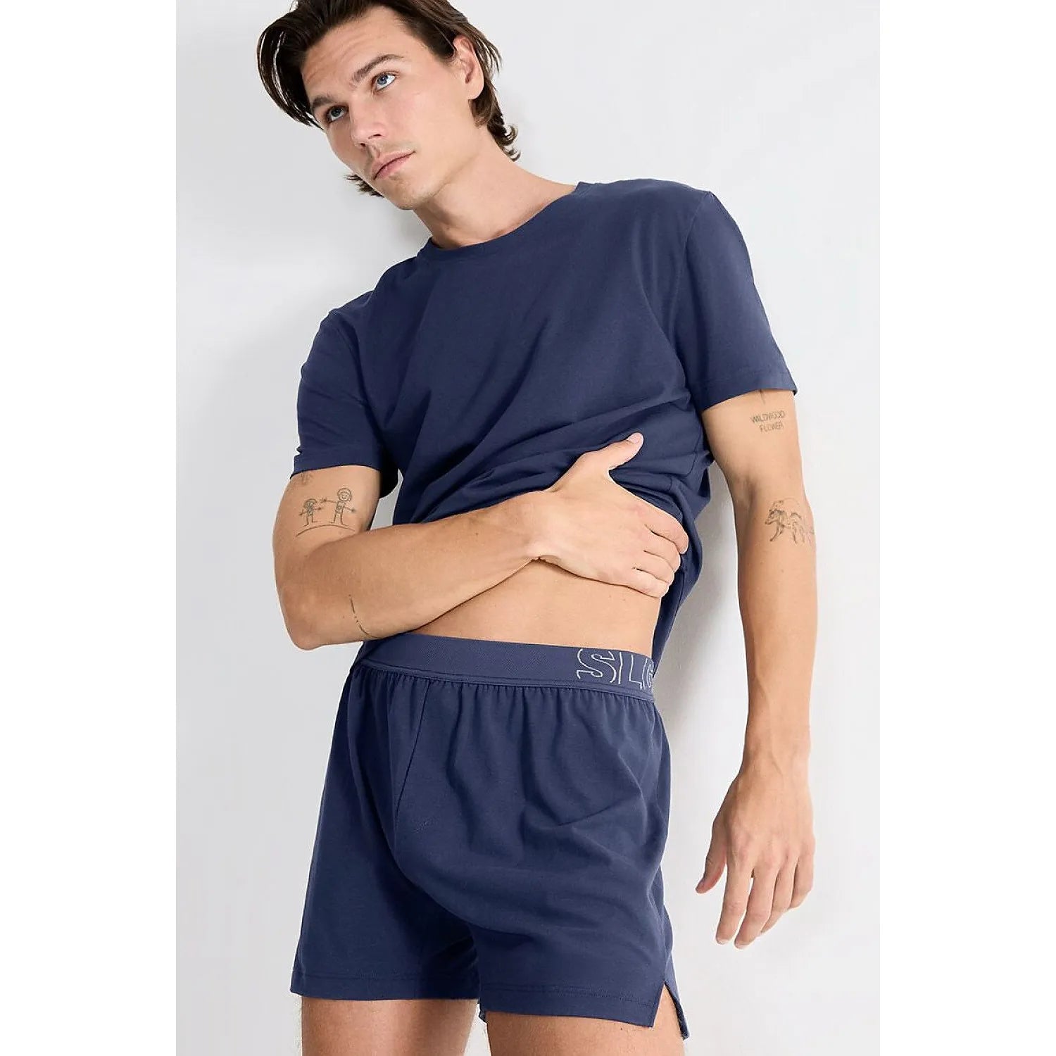 Boxer homme Sloggi bleu marine en coton bio, coupe classique, ceinture élastique, confort et style moderne.