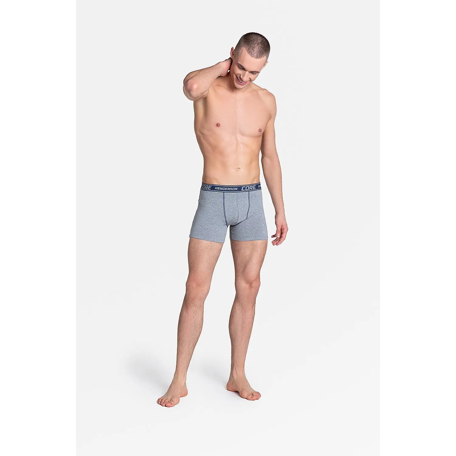 Boxer homme gris athlétique, coton élasthanne, jambes longues, taille élastique avec logo discret, confort respirant.