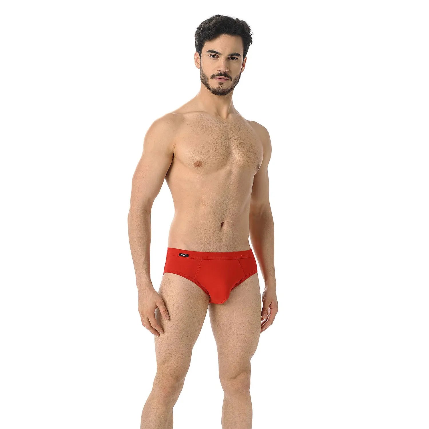 Slip homme rouge vif en coton élastique, ajusté avec ceinture large, confort et maintien optimal.