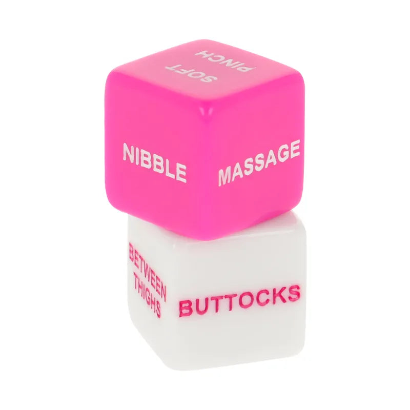 Dés érotiques Moressa rose et blanc en résine sans phthalates, design ergonomique, inscriptions sensuelles visibles.