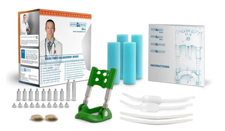 Extenseur pénien Andropenis Mini vert avec accessoires, boîte et manuel, conçu pour petits pénis, traction ajustable.