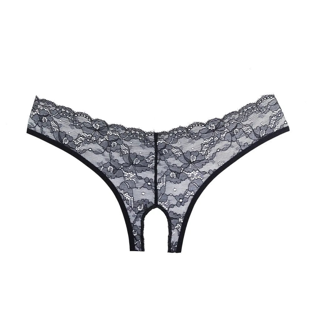 Culotte noire en dentelle ouverte, lanières croisées arrière, élastique, douce et extensible, polyester élasthanne.