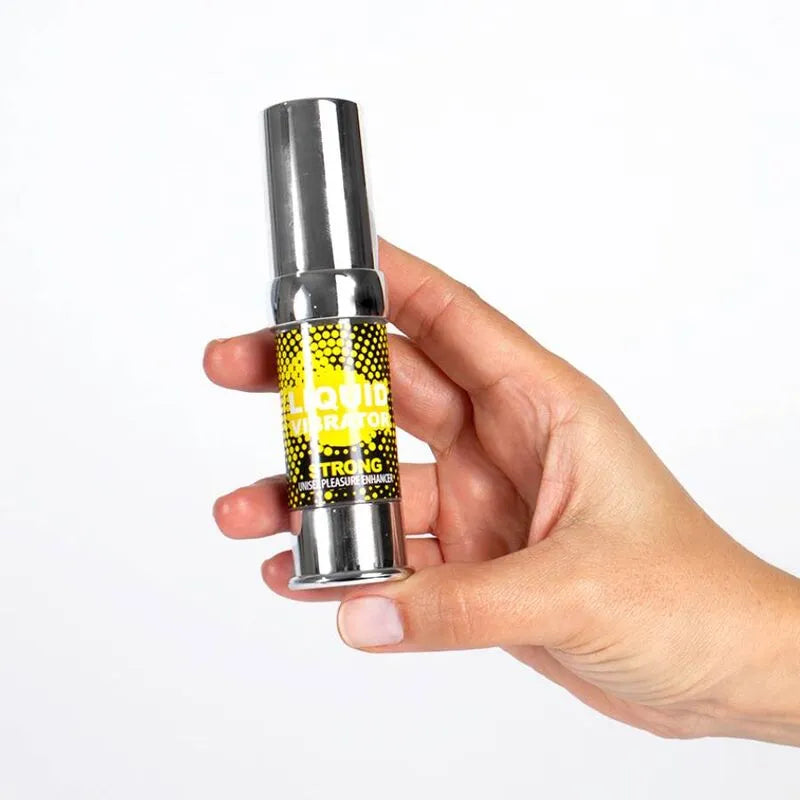 Flacon argenté de gel stimulant vibromasseur liquide unisexe, 15ml, tenu en main, design moderne et compact.