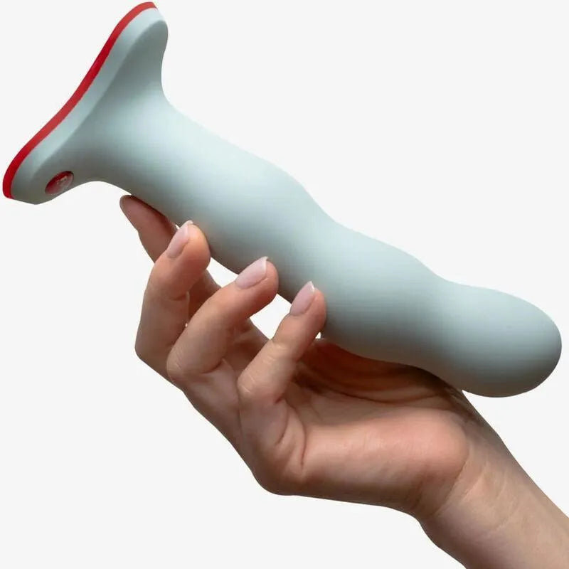 Gode ceinture gris avec base rouge, design ergonomique et balles rebondissantes pour stimulation intense et silencieuse.