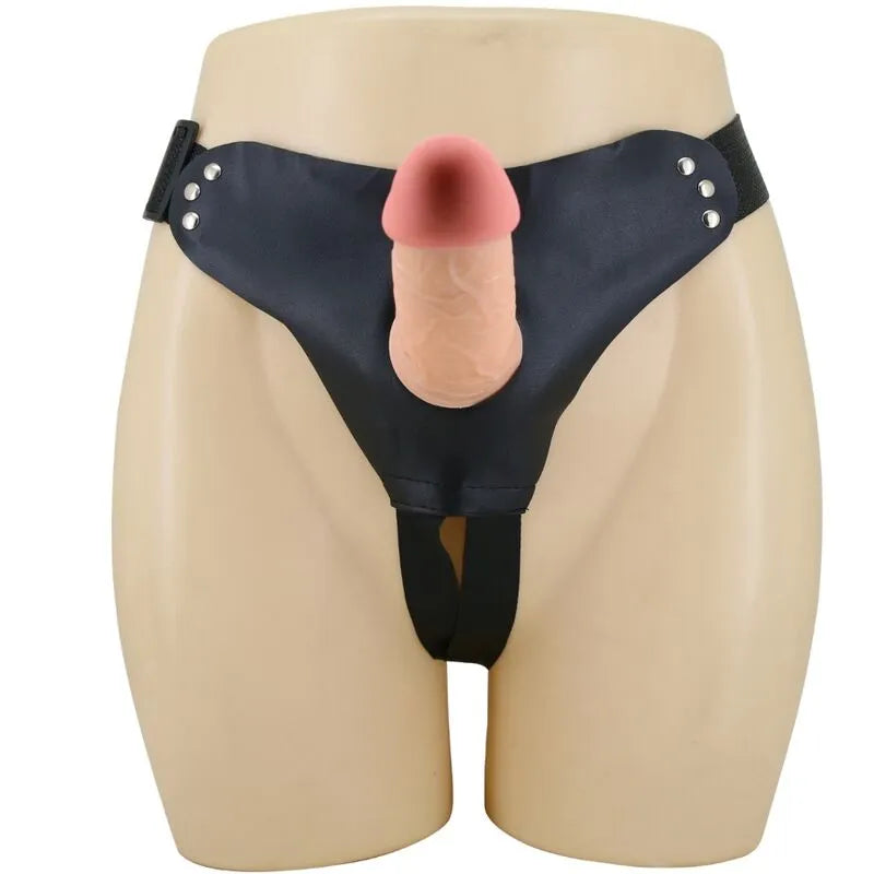 Gode lapin rose avec texture veineuse, harnais noir ajustable en nylon, pour plaisir et confort optimal.