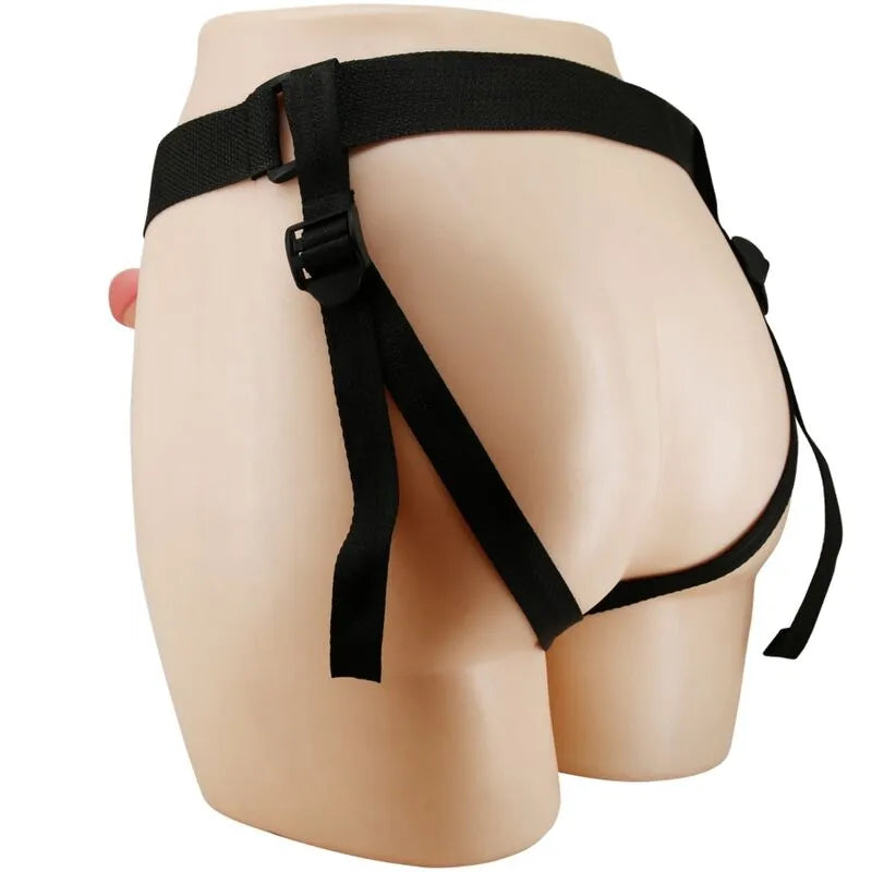Gode lapin rose avec harnais noir ajustable, texture veineuse, sangles en nylon, TPE souple, pour plaisir et confort optimal.