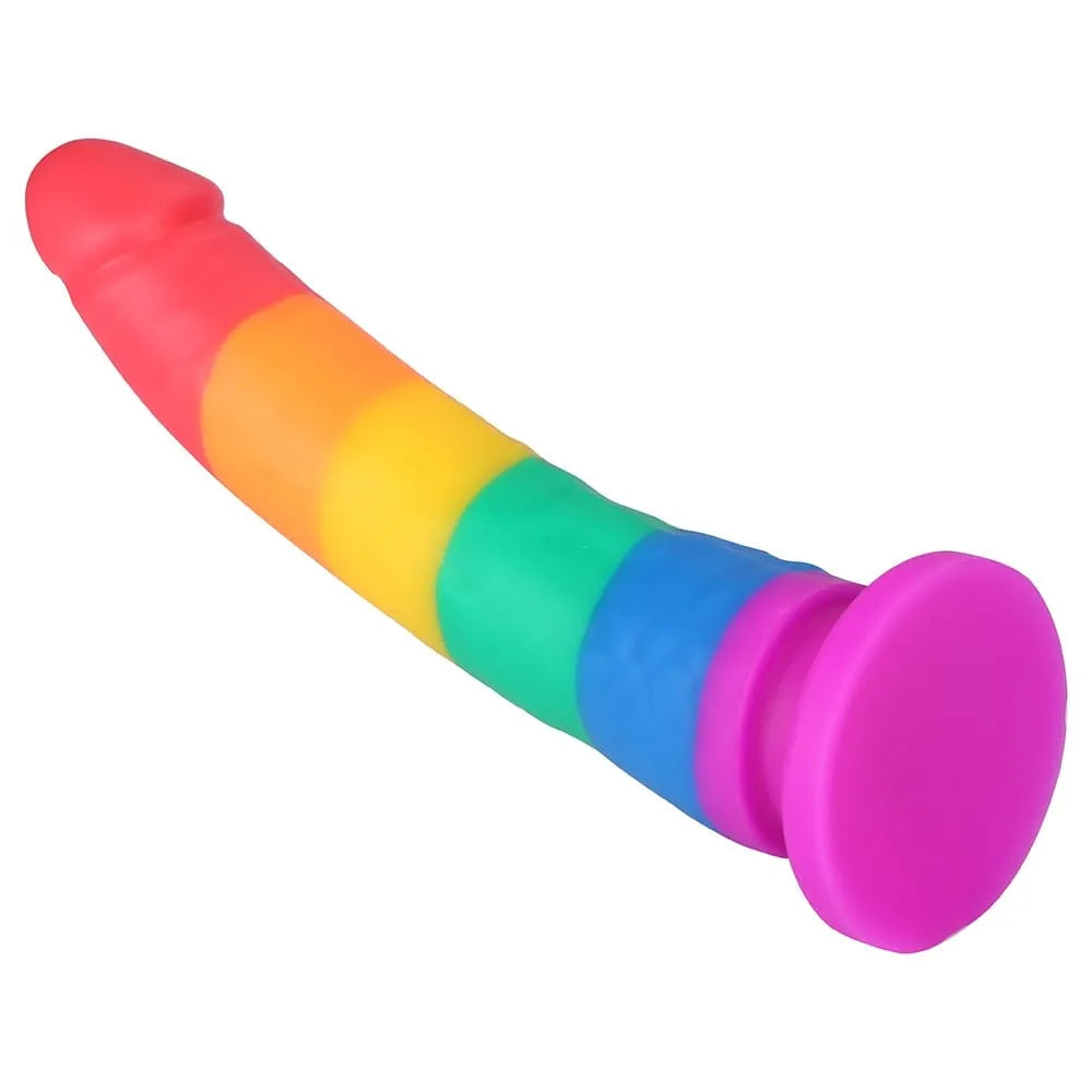Godemichet arc-en-ciel silicone hypoallergénique, formes généreuses, ventouse, compatible harnais, stimulation intime.