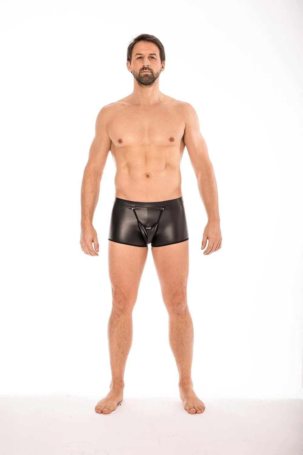 Boxer noir homme en polyester élasthanne, poche détachable, transparence arrière, style sexy et audacieux.