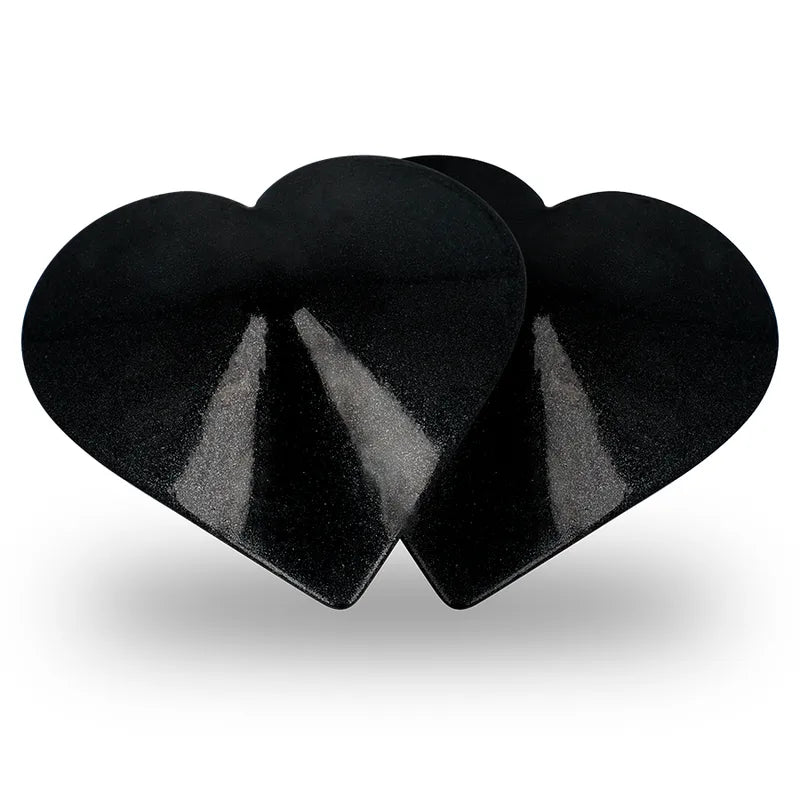 Cache-tétons réutilisables en métal noir en forme de cœur, design élégant et glamour pour soirées romantiques.
