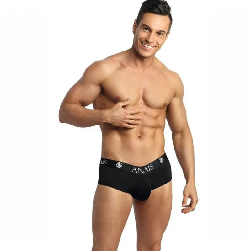Slip bikini homme noir microfibre, ouvert fesses, élégant et moulant, mettant en valeur la silhouette masculine.