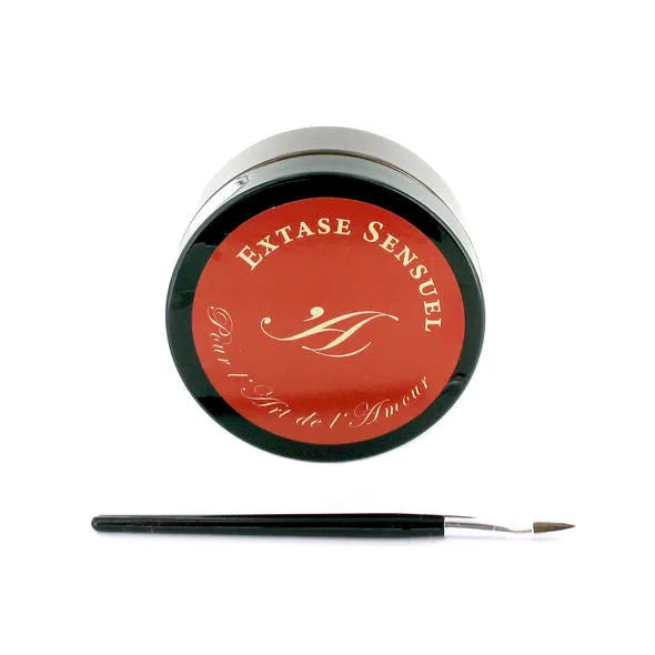 Pot de peinture corporelle au chocolat Extase Sensual avec pinceau, couvercle rouge et texte doré.