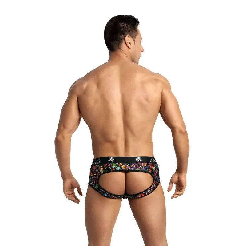 Slip bikini homme Anais noir à motifs colorés, coupe audacieuse avec fesses ouvertes, mettant en valeur la silhouette masc...