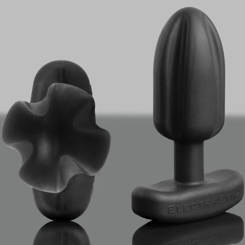 Plug anal quadripolaire noir en silicone, forme de balle, base ergonomique, pour stimulation électrique intense.