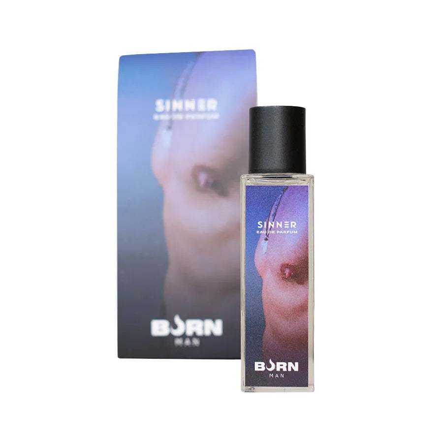 Flacon de parfum BURN SINNER 20 ml, design moderne, notes boisées, pour homme, avec boîte élégante en arrière-plan.