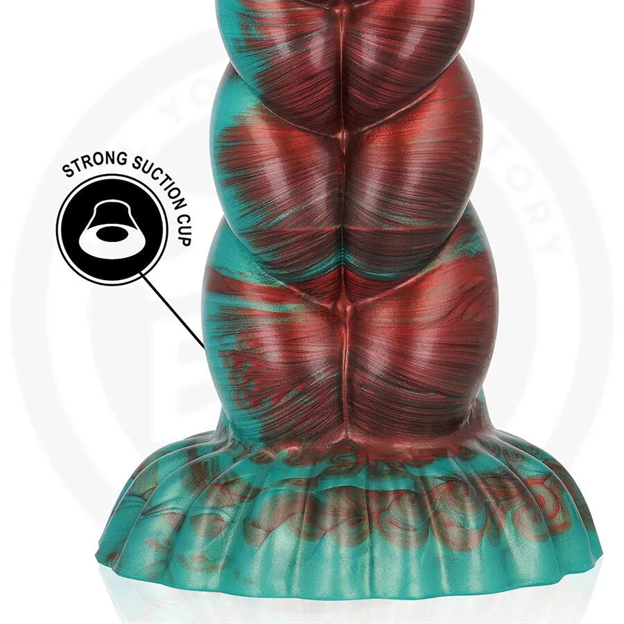 Gode en silicone médical marbré turquoise et bordeaux, segmenté, texturé, base évasée avec ventouse pour stabilité.