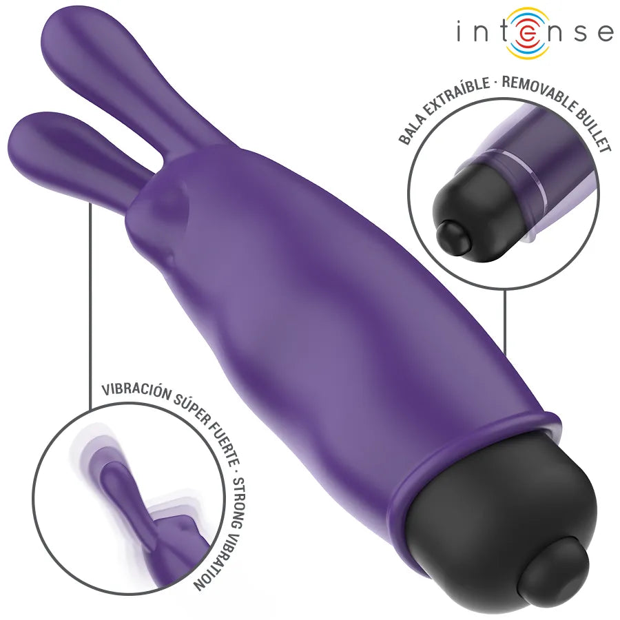 Balle vibrante violette en silicone doux, forme cylindrique avec oreilles de lapin, stimulation clitoridienne précise.