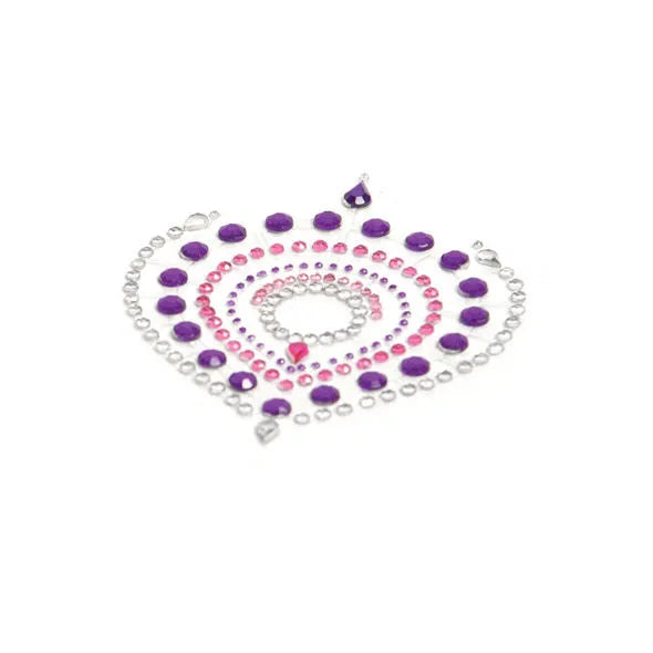 Bijoux intimes lilas et rose en spirale, élégance lumineuse, décoration corporelle raffinée pour occasions spéciales.