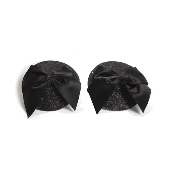 Cache-tétons pailletés noirs avec nœud satin, style burlesque glamour, élégance années folles, taille unique.