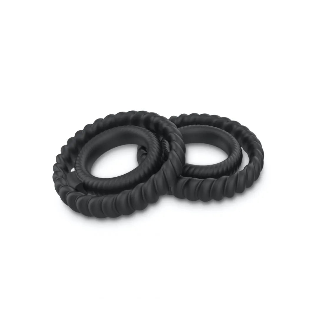 Anneau silicone noir double stimulation, cannelé, flexible, étanche, pour érections longues, pénis et testicules.
