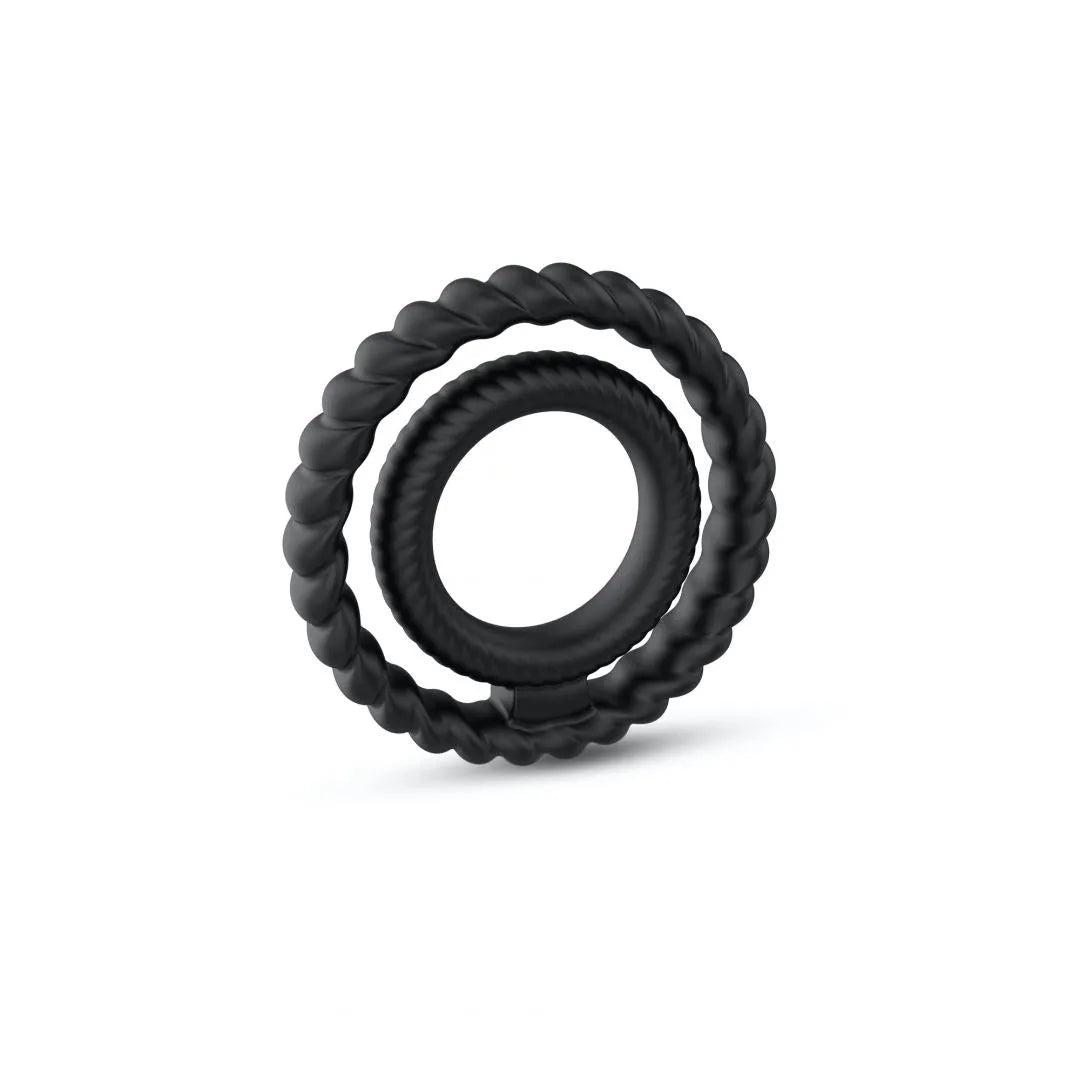 Anneau silicone noir double stimulation, cannelé, flexible, étanche, pour érections longues et confort optimal.