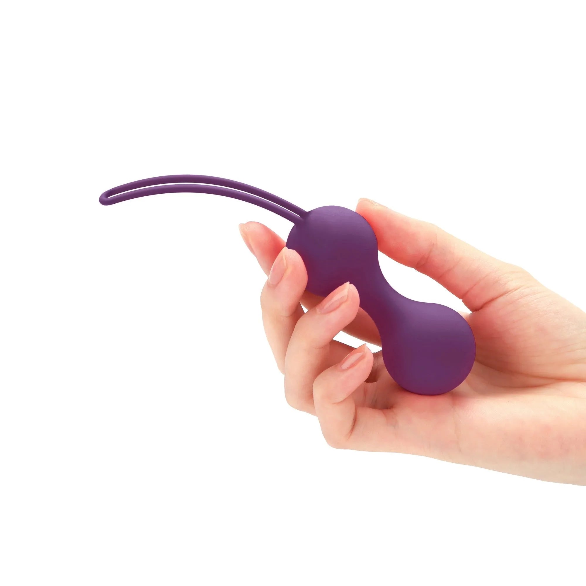 Boules de Geisha violettes en silicone ergonomique pour entraînement périnée, étanches, tenues en main.