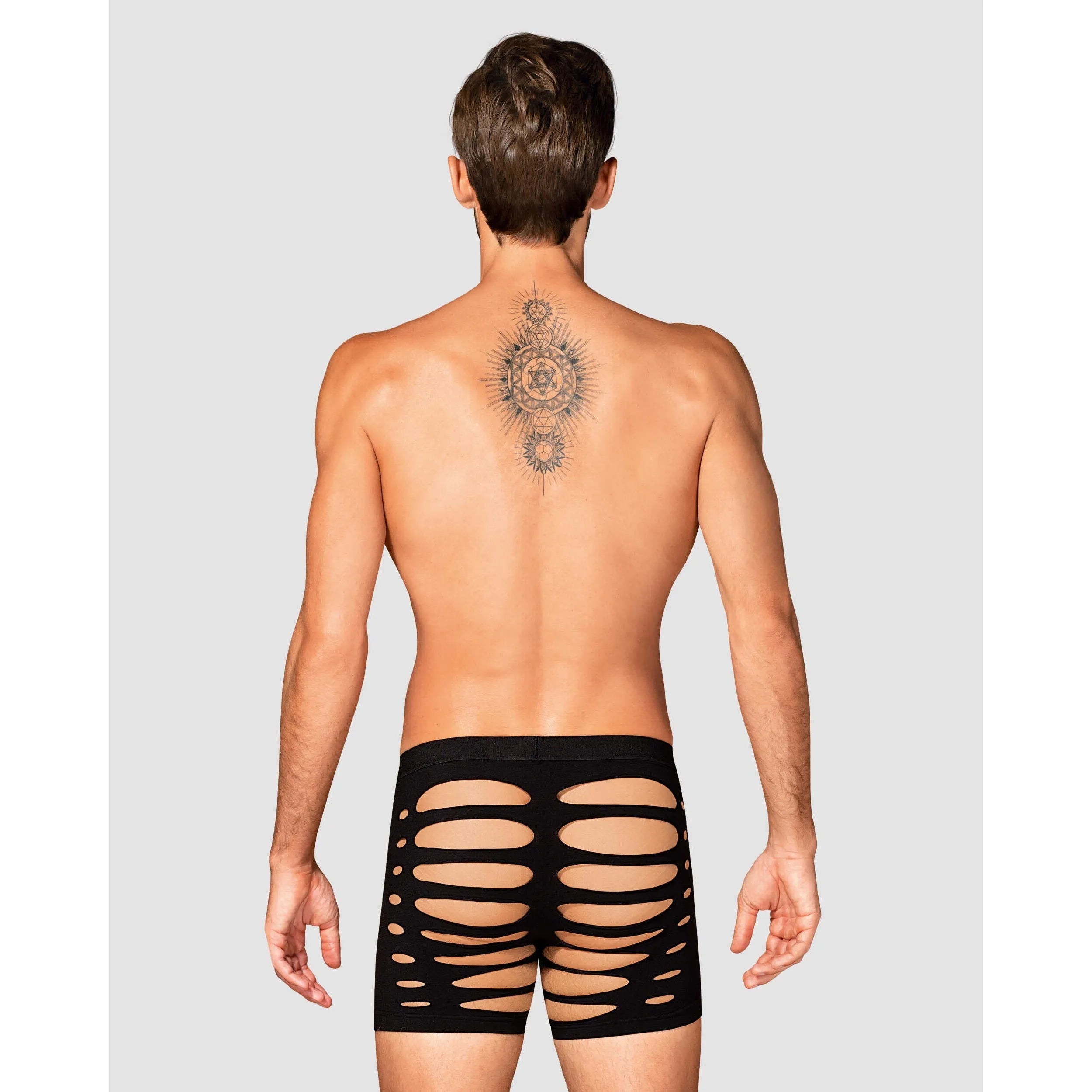 Caleçon noir homme M104, découpes audacieuses, matière élastique, coupe silhouette, allure sexy et confortable.