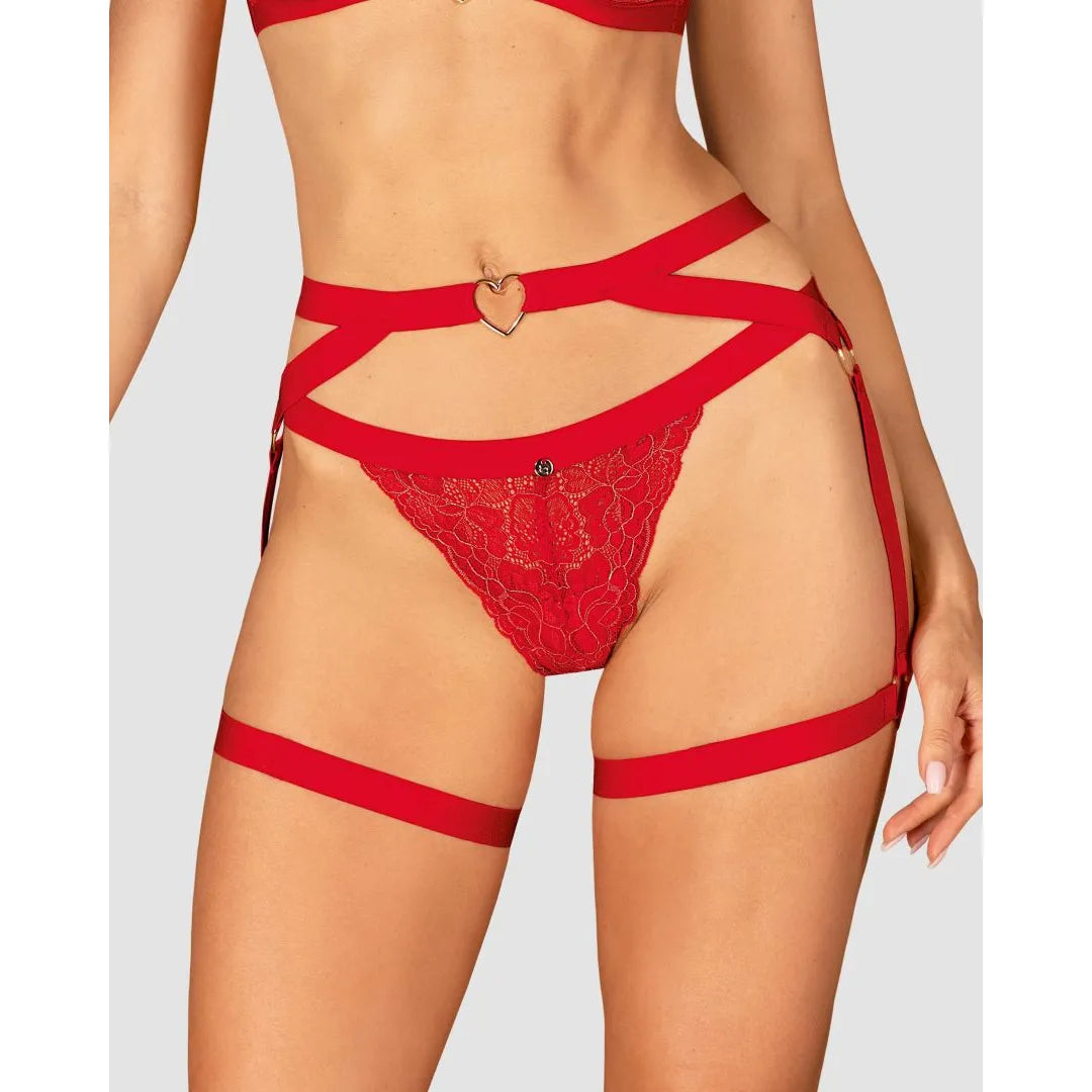 Harnais rouge avec sangles réglables, connecteur cœur doré, design sensuel en polyamide élasthanne, confort extensible.