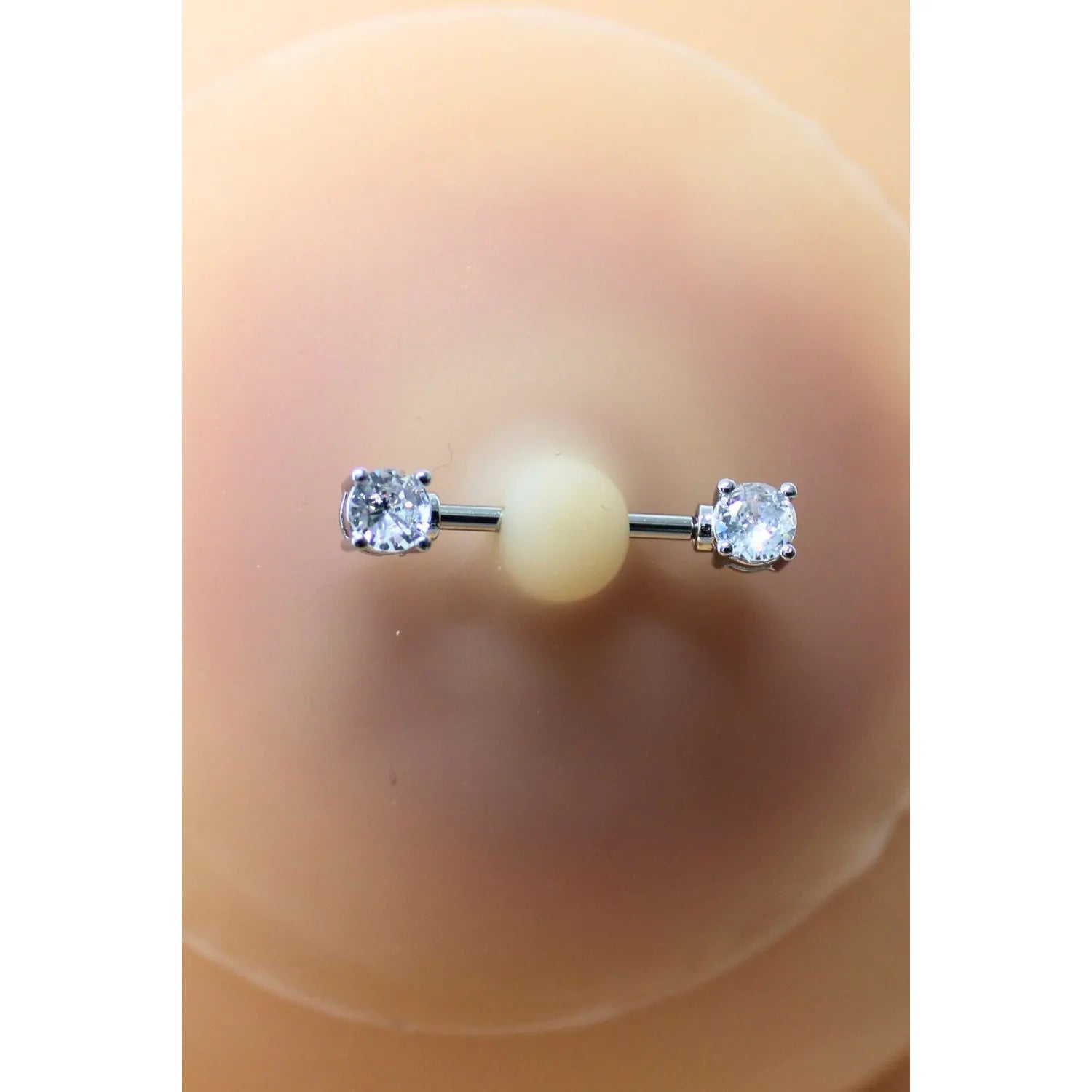 Cache-tétons silicone peau claire avec faux diamant, forme ronde, élégant et discret, pour un maintien sécurisé et confort...
