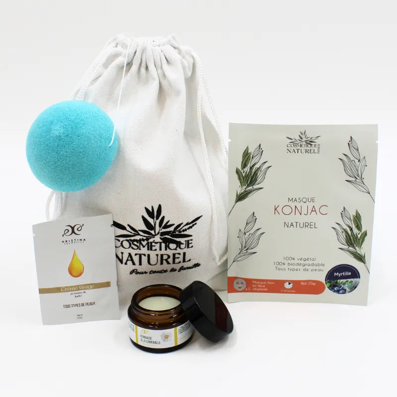 Coffret soins naturels peaux sensibles avec masque Konjac, crème hydratante, éponge bleue et pochette blanche.