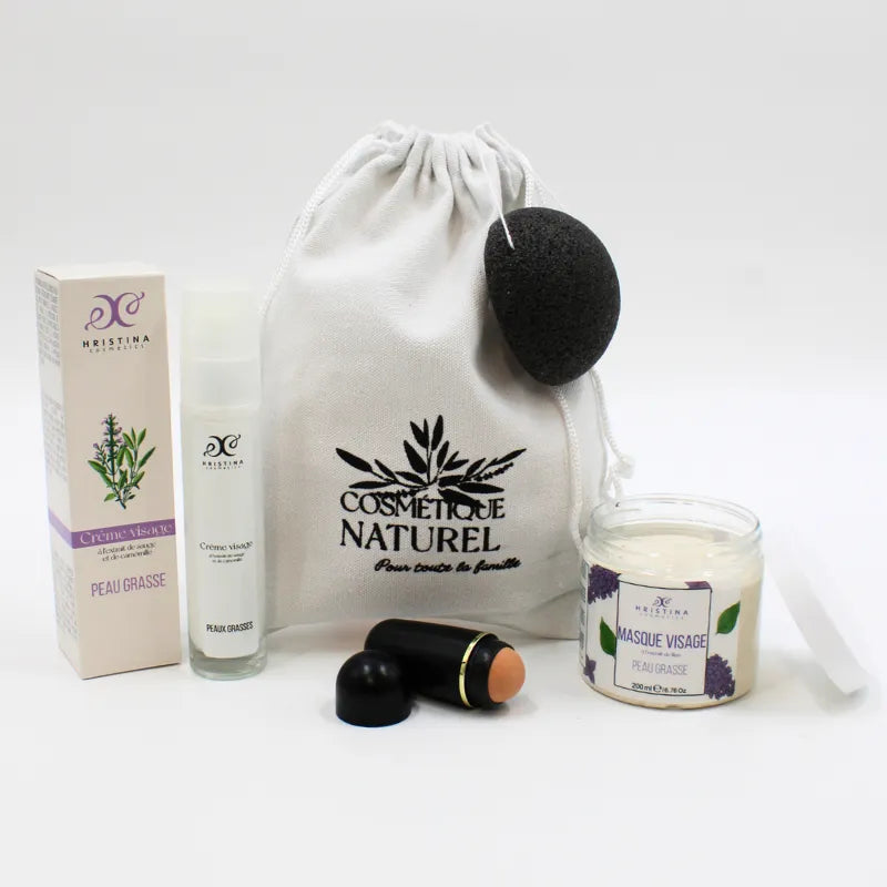 Coffret soin visage peau grasse avec masque lilas, rouleau matifiant, éponge konjac, crème légère, sac blanc.