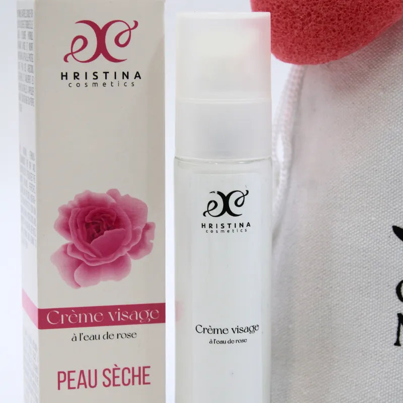 Coffret soin peau sèche avec crème visage rose, éponge konjac rouge et emballage élégant, hydratation naturelle.