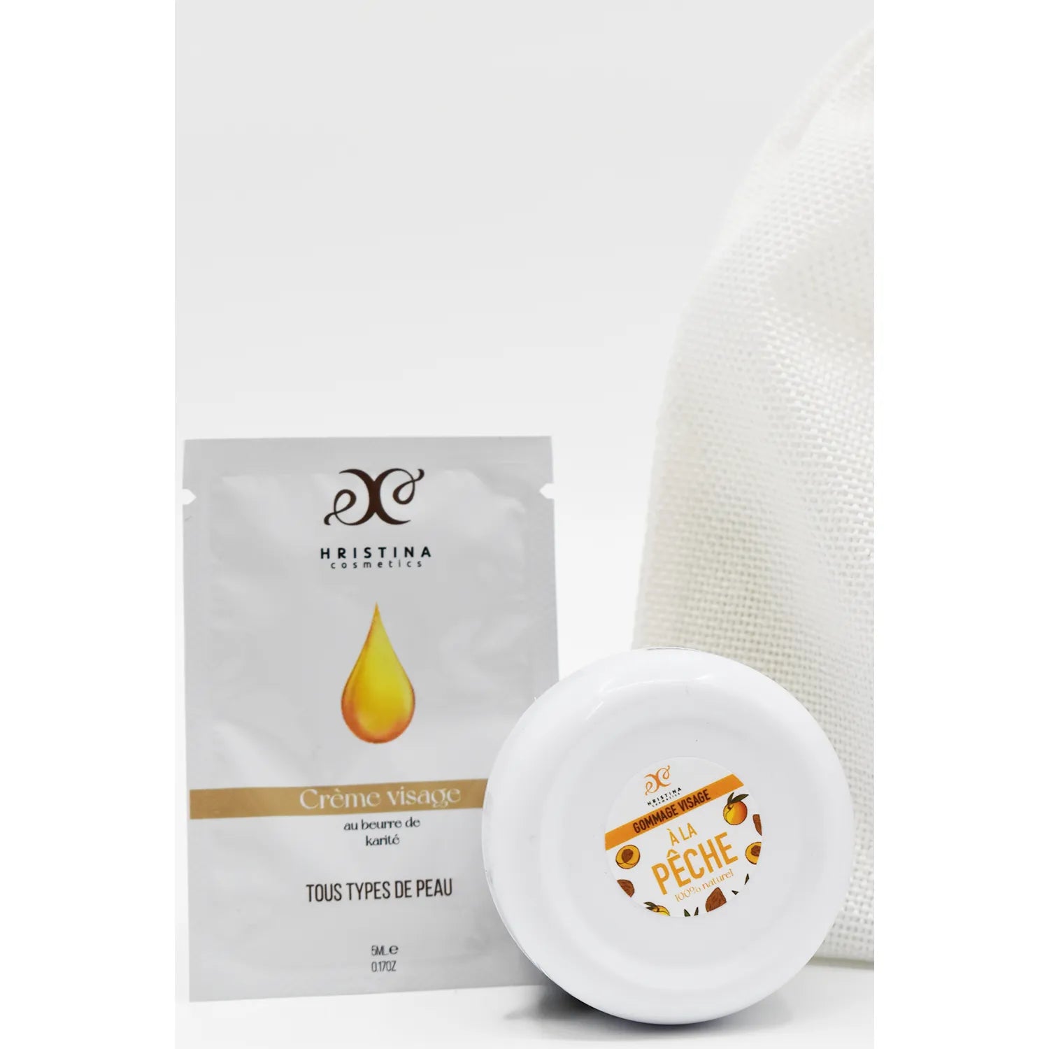 Coffret soin visage rose de Damas, beurre karité, peaux sensibles, crème et sachet, design élégant, naturel.