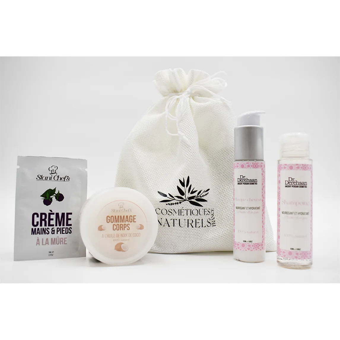 Coffret soins naturels cheveux secs: huile d'argan, gommage coco, crème, flacons et sac blanc, produits beauté.