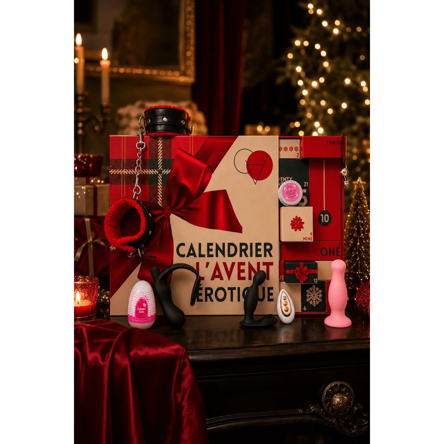 Calendrier de l'Avent érotique gay avec sextoys et accessoires, boîte rouge et noire, ambiance festive et intime.