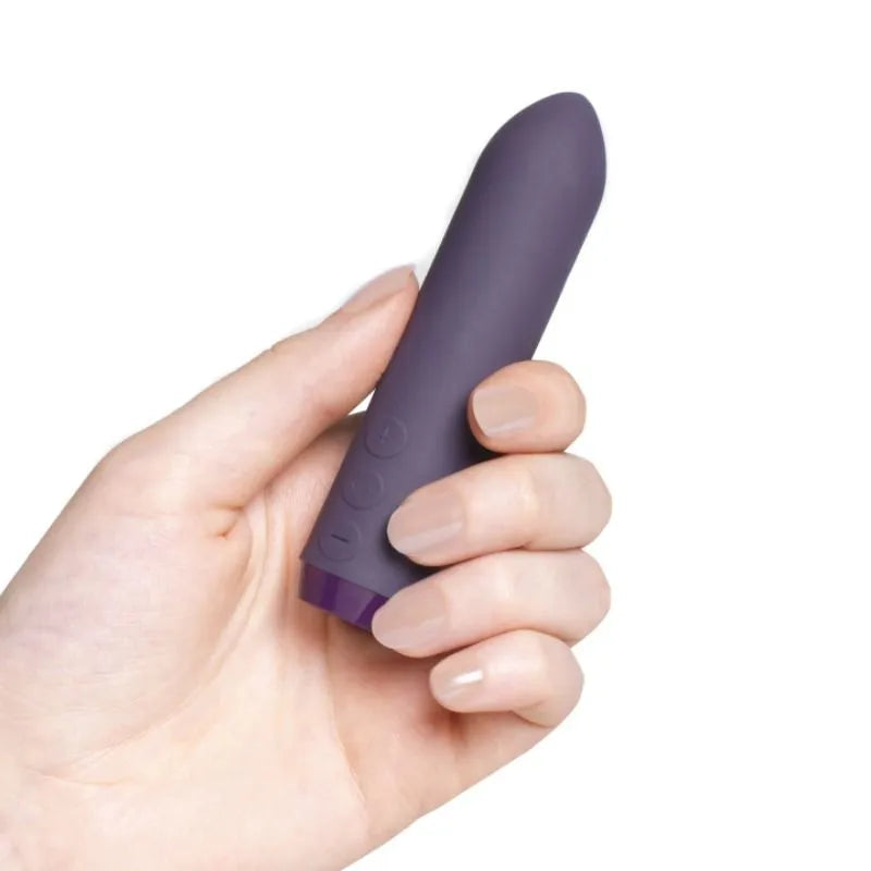 Vibromasseur silicone violet ergonomique compact, boutons intuitifs, design waterproof, mains libres, rechargeable.