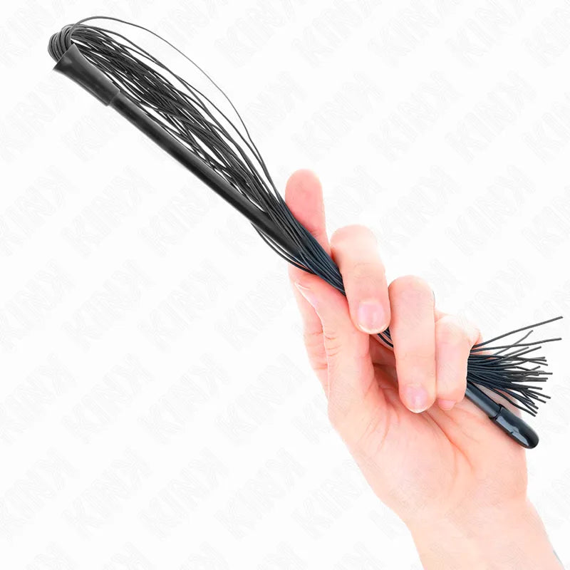 Cravache BDSM en cuir noir véritable, design élégant et robuste, idéale pour jeux sensuels, haute qualité et raffinement.
